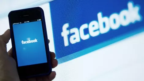 Facebook's strong 2013 dimmed by a slowdown in revenue growth